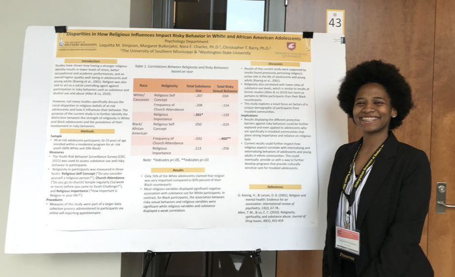 LaQuitta Simpson presenting research done in Dr. Nora Charles' Youth Substance Use and Risky Behavior Lab
